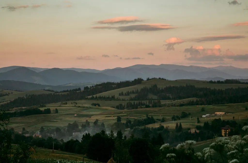 Rolling hills and villages in the Carpathian countryside